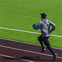 student running on track