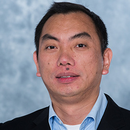 Headshot of professor Ming Hu