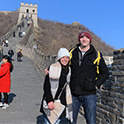 Two people pose on the great wall of China