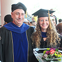 Kate Mingle poses at her graduation with Dr. Lauterbach