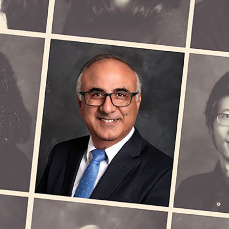 Headshot of Nasiri highlighted in a year book filled with pictures of othe rprofessors