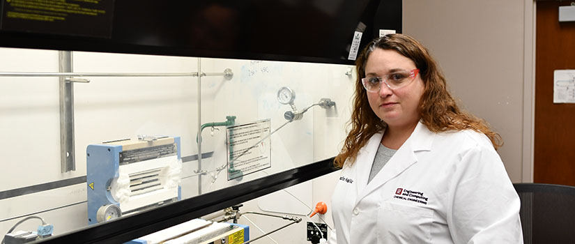Jennifer Naglic standing in lab