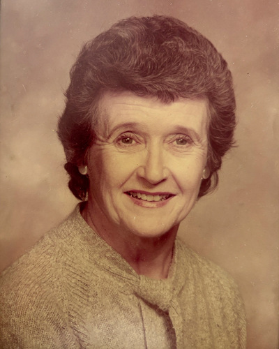 Sepia colored headshot of a woman