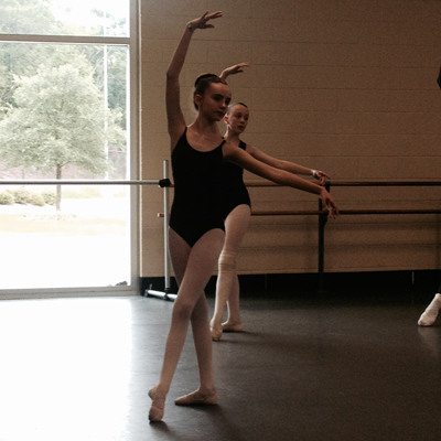 Ella Sanders as a child practicing ballet at one of USC's summer intensive programs.