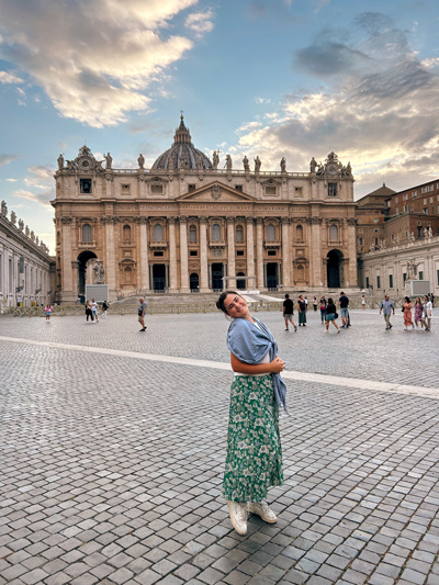 Ruth Moniz in front of St. Peter's Basilica in Vatican City, Rome, Italy