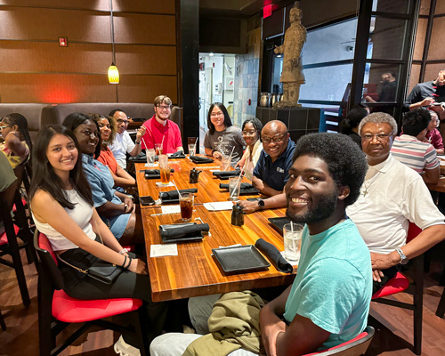 Tremayne Ansani at a group dinner.