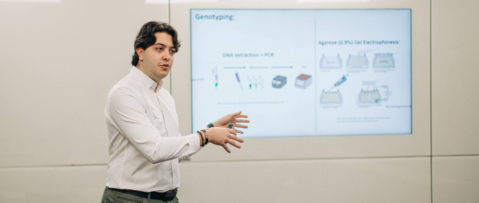 Pre-med Student presenting at thesis symposium