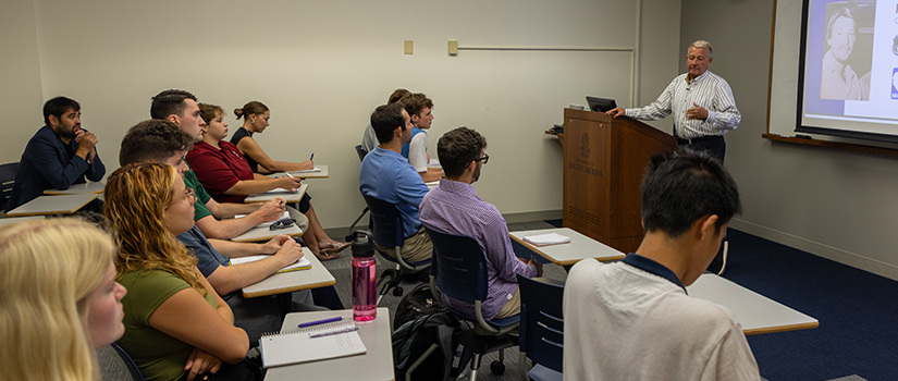 Peter Luukko speaks to students in a class