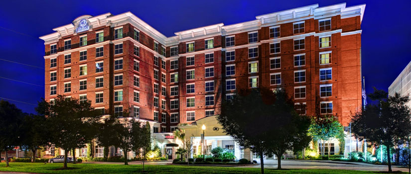 Night photo of the Columbia Hilton in the hear of the Vista, Columbia, S.C.