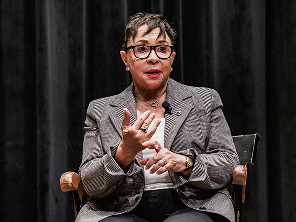 Sheila Johnson speaks to a group of student