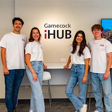Four Gamecock iHub interns pose for a photo.