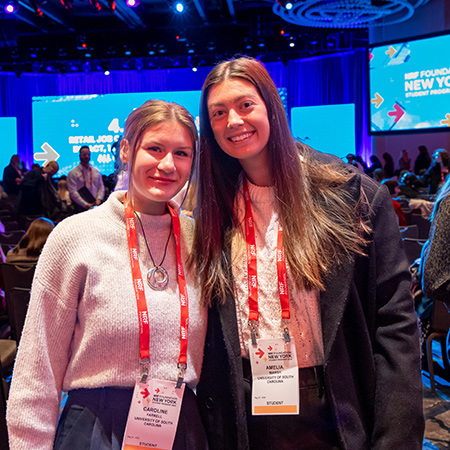 Two students pose at the NRF Conference