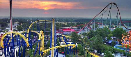 View of Carowinds rollercoaster, Nighthawk, at sunset 
