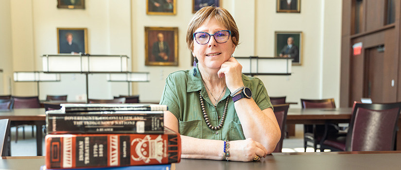 Rebecca Plevel sitting in the law library's reading room