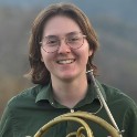 Peyton Bewley holding a horn