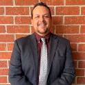 Ryan Gonzalez in front of a brick wall
