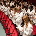 students at white coat ceremony