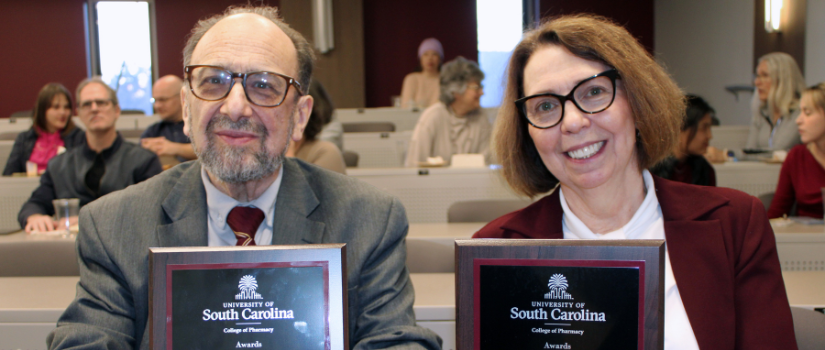 Roninson and Broude with awards