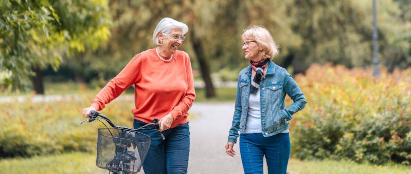 older women biking and walking