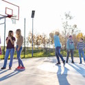 teens on basketball court