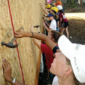 Students building a wall