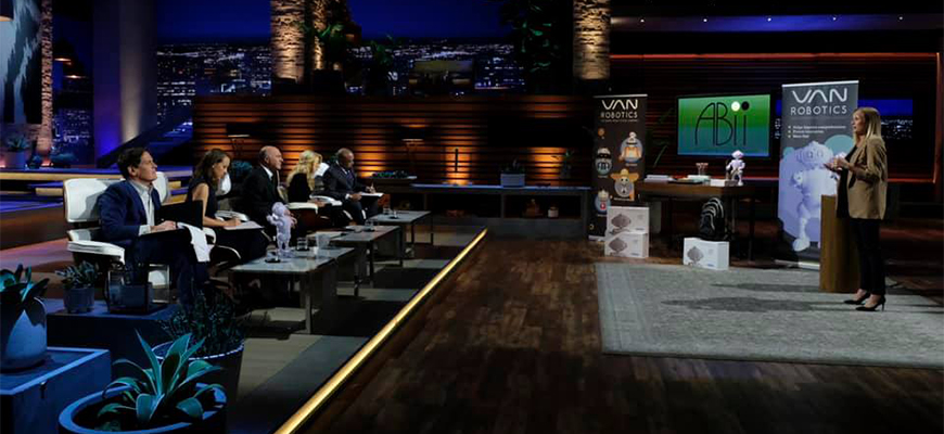 Laura Boccanfuso stands before the judges on NBC's "Shark Tank" to pitch her company's ABii robot tutor.