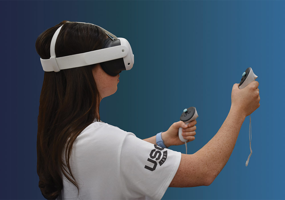 sideview of student wearing VR goggles