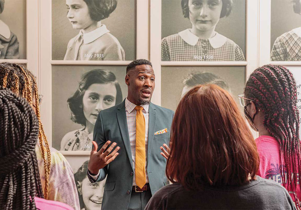 Doctoral candidate Devin Randolph gives tour of Anne Frank Center