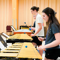 Students practice xylophone during music camp.