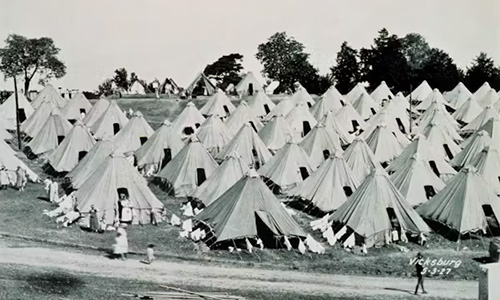 Tents set up in rows at refugee camp