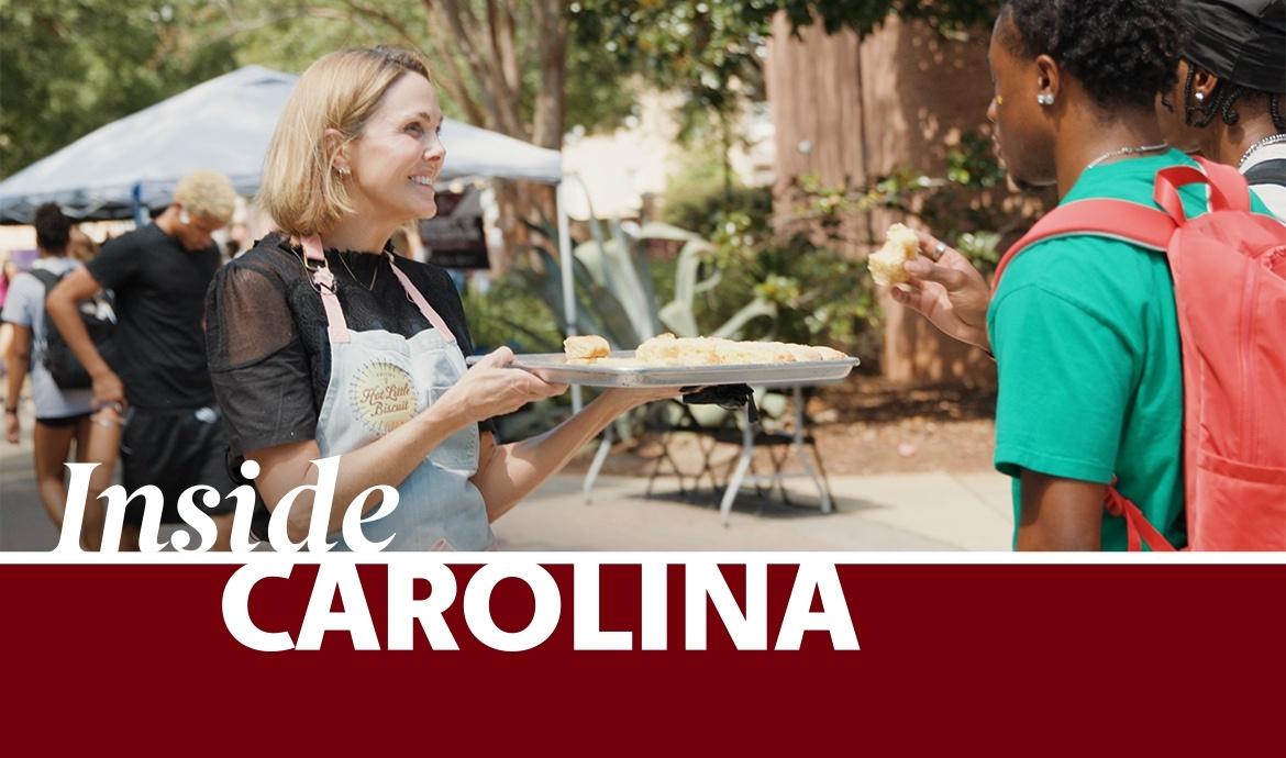 graphic that has a frame with the words Inside Carolina over an image of Carrie Morey serving biscuits to a student