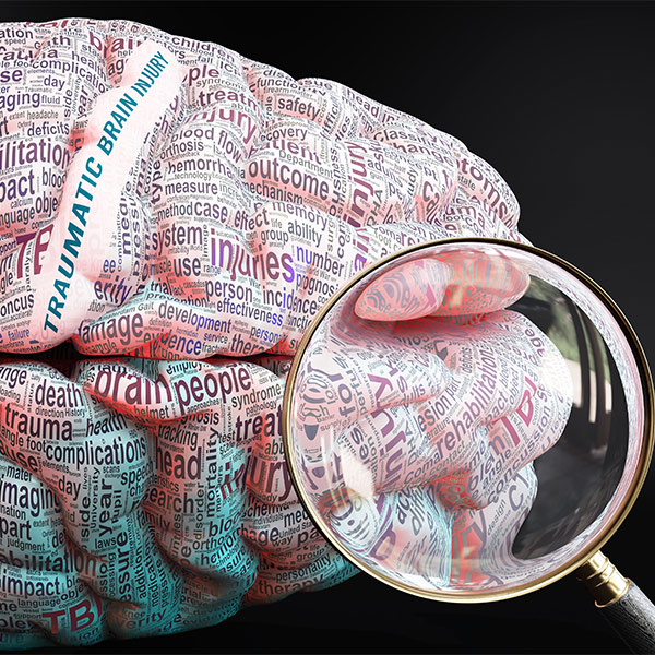 Close-up of brain with a magnifying glass
