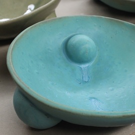 a turquoise bowl by Virginia Scotchie