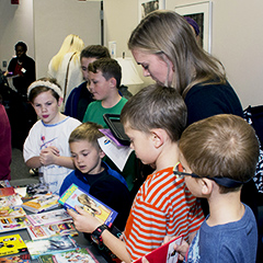 Students look at books