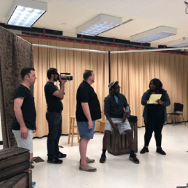 Cast of Armida practices for the show.