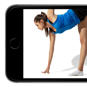 girl doing yoga shown on screen of iphone