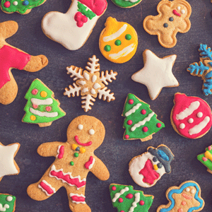 Christmas cookies in a variety of holiday shapes with multicolored icing and decorations