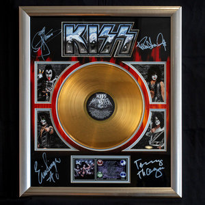 A KISS gold record in a frame