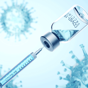 Digital generated image of syringe filling of COVID-19 vaccine from bottle against viruses on blue background