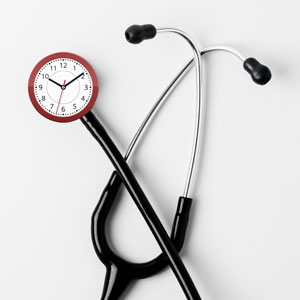 A medical stethoscope with a clock transposing the drum.