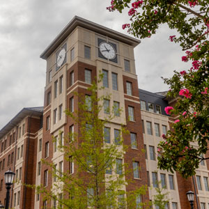 A photo of the clock tower at Campus Village.