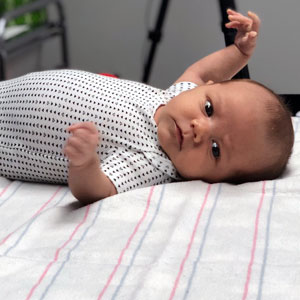 Image of infant lying on a table