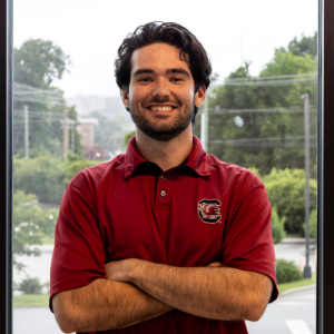 Michael Carson, an intern for USC Facilities, poses for a portrait.