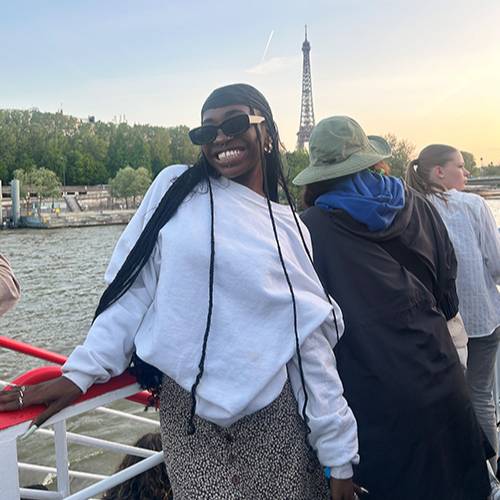 Kanyisile Barrett enjoys an evening on the Seine River.