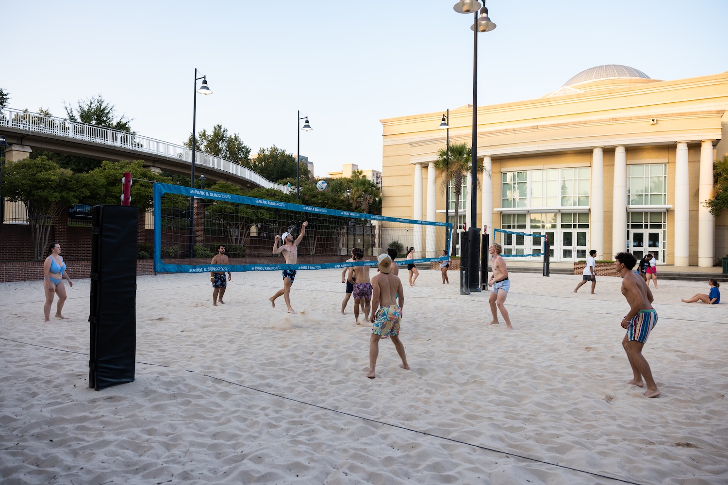 Men playing beach volleyball