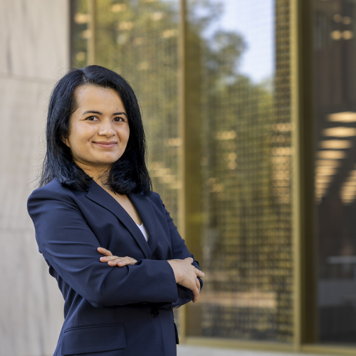 Zo Sediqi stands outside USC's library.